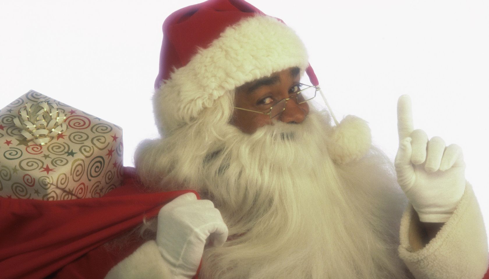 Santa holding bag of gifts