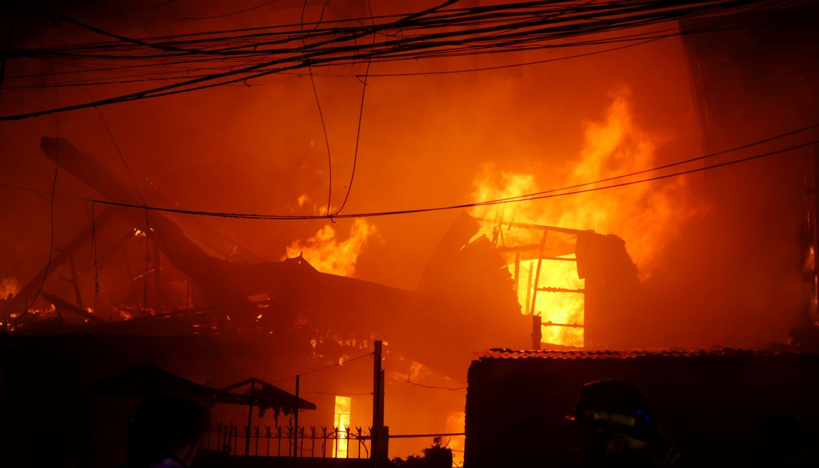 The house started crumbling down as it burns to ashes.