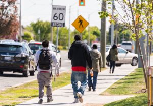 Youth walking on the street with low lowered pants. Sagging...