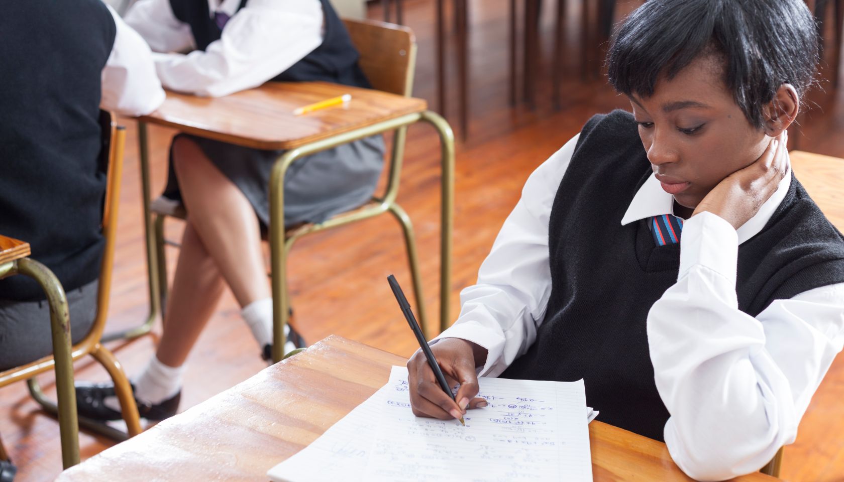 Student practicing maths in the classroom, Cape Town, South Africa