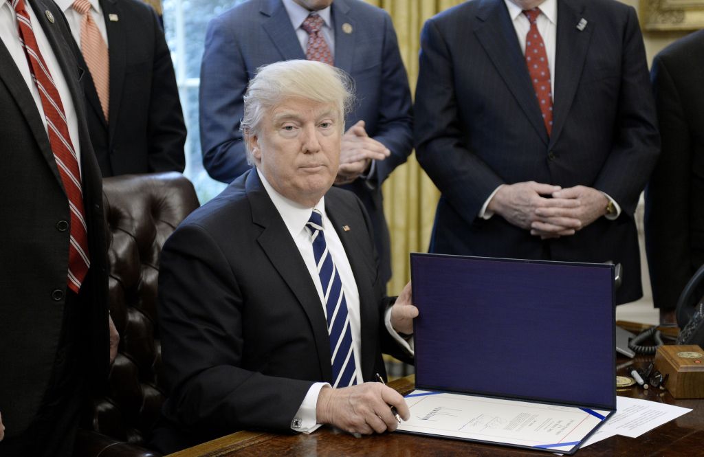 President Trump Signs A Resolution Related To Financial Reform