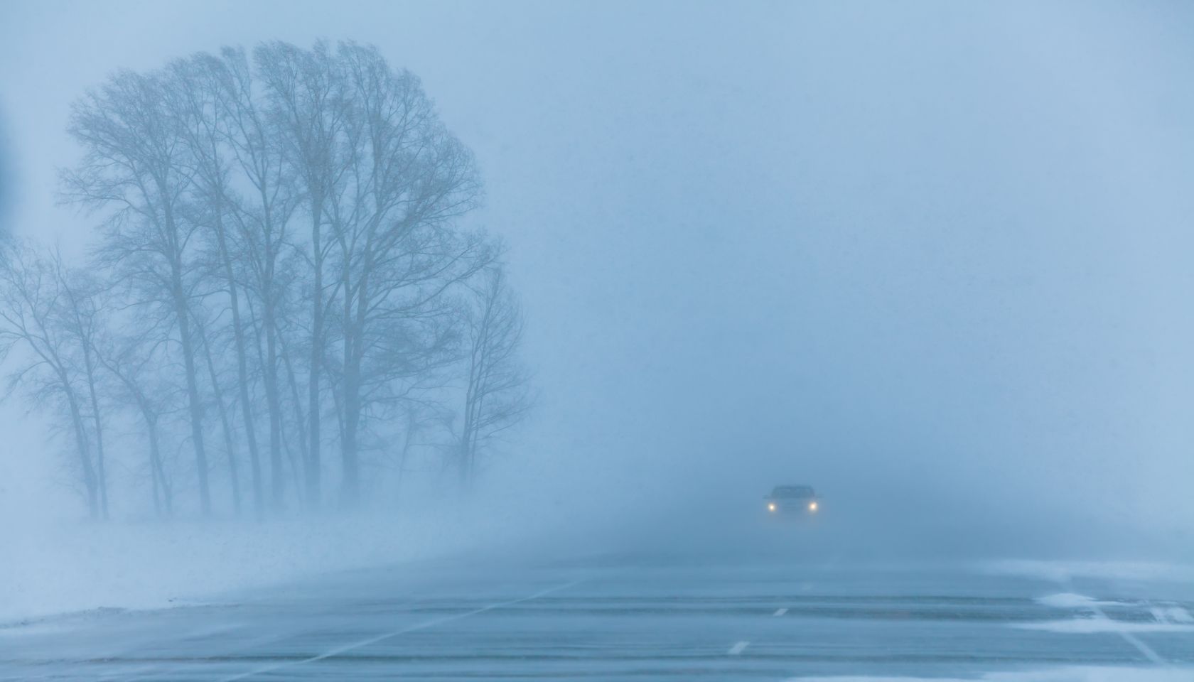 Countryside road during snow storm
