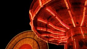 Spinning Amusement Park Rides at night.