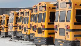American yellow style school buses in winter