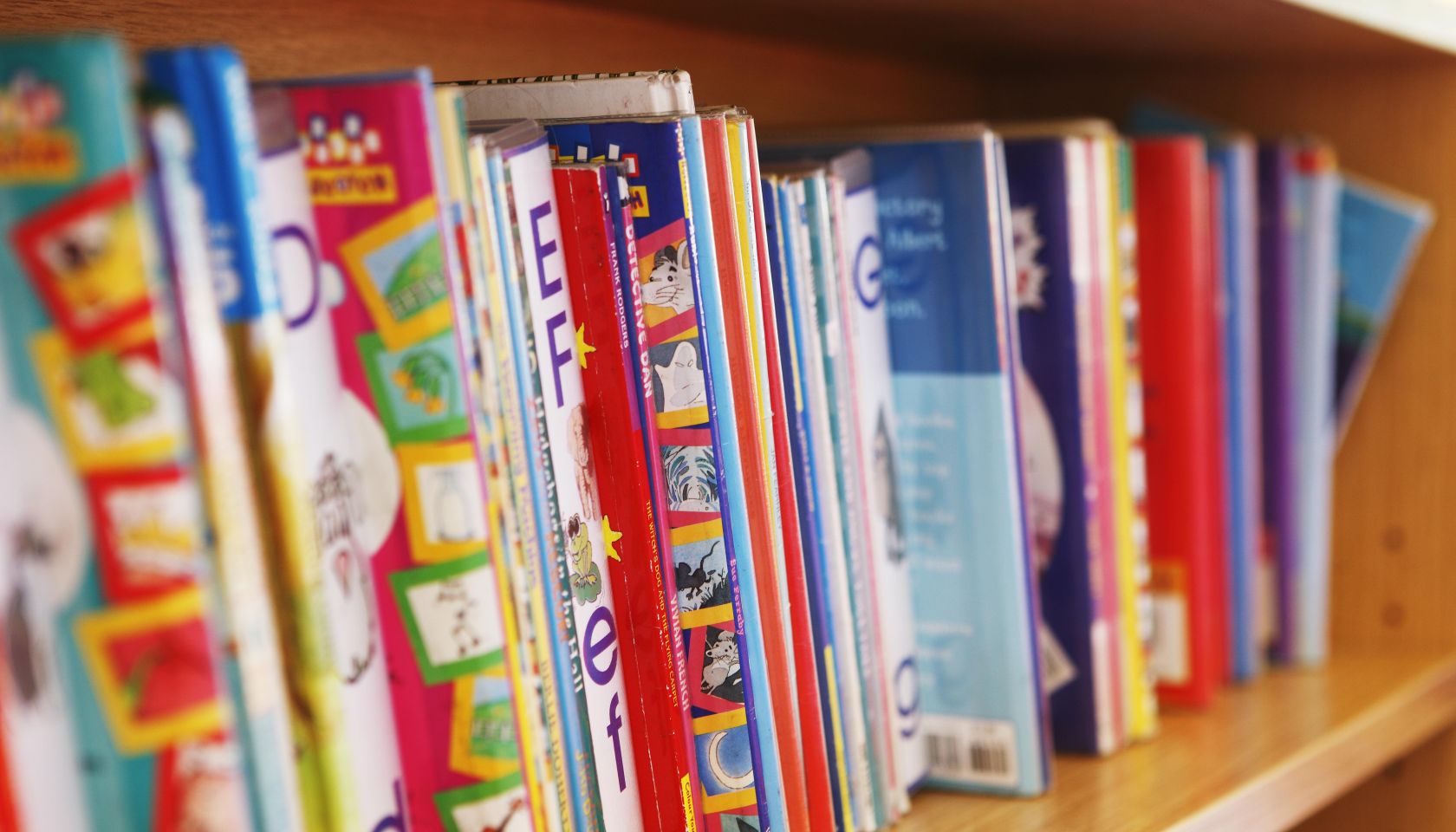childrens reading books on bookshelf